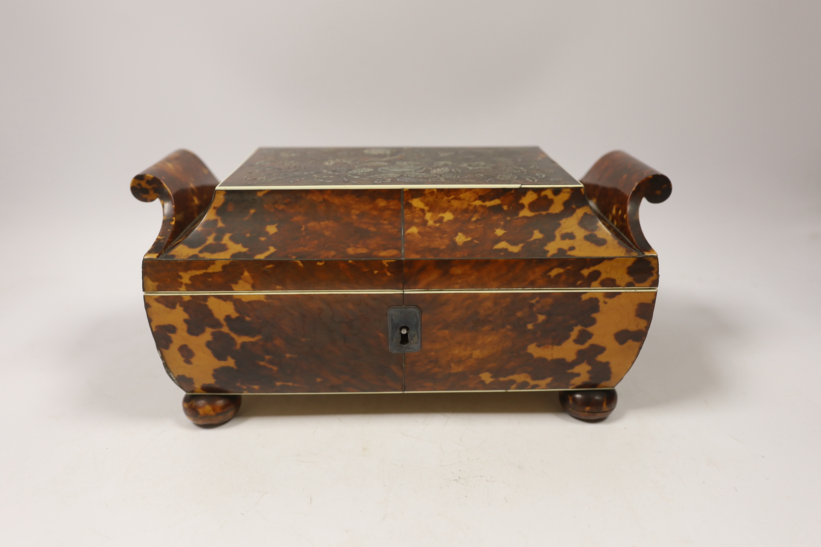 An early 19th century tortoiseshell and mother of pearl inlaid work box with ivory banding, 24cm wide, 16cm deep, 12cm high CITES Submission reference, EWCE2JLY